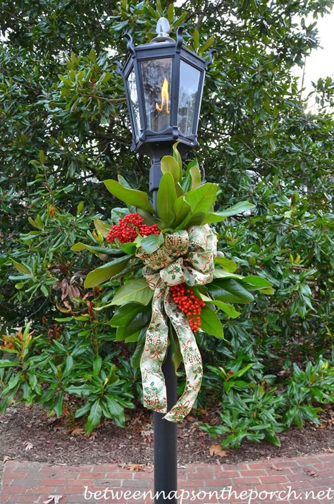 Decorate a Lantern for Christmas with Greenery from the Garden Decorating A Lantern For Christmas, Christmas Lamp Post, Mailbox Decor, Christmas Lamp, 12 December, Christmas Greenery, Christmas Swags, Christmas Arrangements, Christmas Lanterns