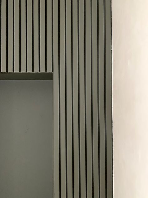 Slat Panelling Hallway, Painted Wood Slats On Wall, Green Slat Wall Bedroom, Basement Slat Wall, Wood Slat Wall With Window, Green Wood Slat Wall, Slat Wall Stairwell, Painted Wood Slat Wall, Slat Wall Green