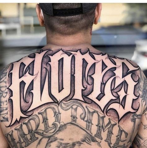 Back Lettering Tattoo Men, Negative Lettering Tattoo, Tattoo Lettering Fonts For Men, Back Name Tattoo, Negative Space Tattoo Lettering, Chicano Numbers, Chicano Lettering Tattoo, Chest Tattoo Fonts, Lettering Chicano