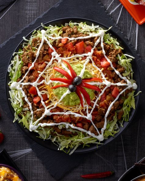 Spiderweb Taco Dip, Halloween Nachos Ideas, Spooky Nacho Bar, Halloween Coleslaw, Spooky Mexican Food, Halloween Nacho Bar Ideas, Spooky Nachos, Halloween Salad Ideas, Halloween Nacho Bar