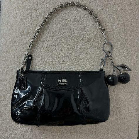 $220 free shipping 💌SOLD coach black patent leather bag 🖤 approx measurements 9” x 5” PRICE FIRM NO OFFERS - rare! hard to find - excellent condition, interior has minor stains - unbranded charm included - 7” drop shoulder chain, with cherry 8” drop #patentleather #coach #y2k #trending #coachbag Patent Leather Bag, Coach Handbag, Handbags Crossbody, Shoulder Chain, Handbag Black, Fossil Bags, Coach Purse, Black Patent Leather, Handbag Purse