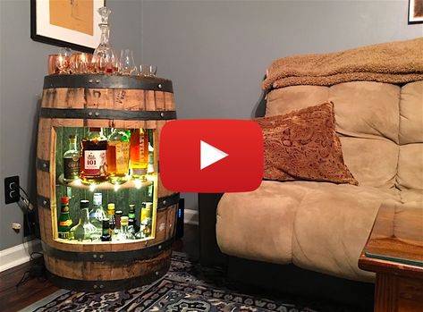 In this video, we show you how to make a wine or whiskey barrel liquor cabinet with nothing but a drill ... Diy Whiskey Barrel Bar, Whiskey Barrel Liquor Cabinet Diy, Whiskey Cabinet Diy, Whiskey Barrel Liquor Cabinet, Wine Barrel Table Diy, Bourbon Barrel Projects, Barrel Table Diy, Barrel Liquor Cabinet, Wine Barrel Diy