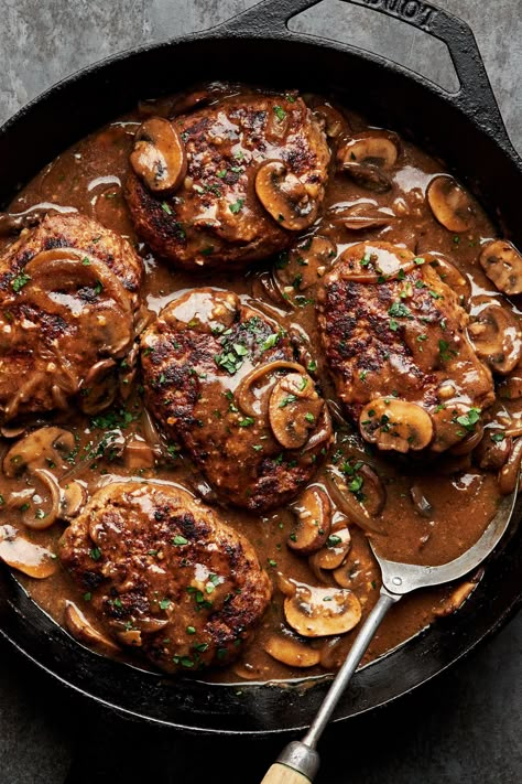 Salisbury steak is, of course, not steak at all. Think perfectly browned ground beef patties, seasoned with abandon and served with onion-and-mushroom gravy. So yeah, now you know what’s for dinner!