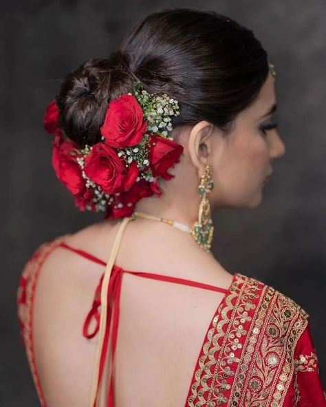 Bloom and Bun: Elegant Hairstyle Ideas for Ladies Who Love Flowers Bengali Bride Hairstyle Bun, Bun Hairstyles For Bride Indian, Bridal Bun Hairstyles Indian Flower, Bengali Bride Hairstyle, Bridal Floral Bun, Gajra Hairstyles Buns, Bride Hairstyles Indian Wedding, Bridal Bun Hairstyles, Bun Elegant