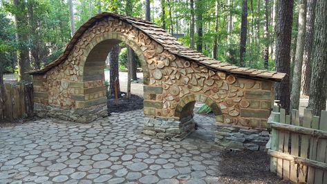 Cordwood wall / entryway Cordwood Wall, Wooden Grotto For Statue, Wall Entryway, Cordwood Homes, Earth House, Cord Wood, Architectural Sculpture, Building Contractors, Barn Renovation