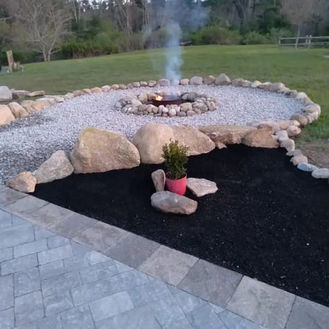 Stone Path To Fire Pit, Pebbled Fire Pit Area, Backyard Beach Fire Pit, White Rock Fire Pit Area, Fire Pit Gravel Ideas, Large Rock Fire Pit, Fire Pit Stones Rocks, Backyard Stone Fire Pit Ideas, Octagon Fire Pit Area