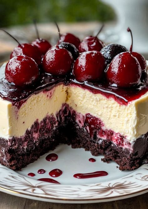 Indulge in a decadent Black Forest Cheesecake! 🍒🥮 Layers of rich chocolate, creamy cheesecake, and cherries. A must-try dessert masterpiece! #BlackForest #Cheesecake #DessertLovers #Baking #ChocolateFix Mini Marbled Cherry Cheesecakes, Black Forest Parfait, Devils Food Cheesecake, Mini Springform Pan Recipes Cheesecake, Black Forest No Bake Cheesecake, Dark Chocolate Cherry Cheesecake, Maraschino Cherry Cheesecake, Cherry Chocolate Cheesecake Recipes, Black Cherry Cheesecake