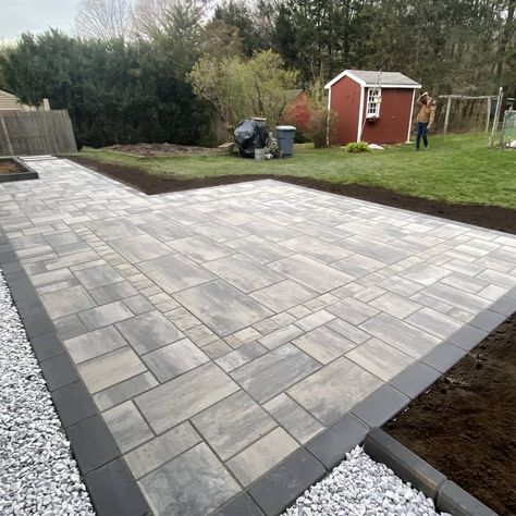 Check out this unique beauty of a patio we completed today in Manchester, CT - 450sq ft patio using Techo-bloc Blu Smooth HD Shale grey, an inlay table area of Blu Grande Smooth with a Valet champlain grey border and onyx black Blu smooth for the exterior border. All in all a very unique and awesome patio project! Backyard Entertainment, Driveway Pavers, Unique Patios, Paver Patios, Pool Pavers, Inlay Table, Shale Grey, Paver Designs, Grey Patio