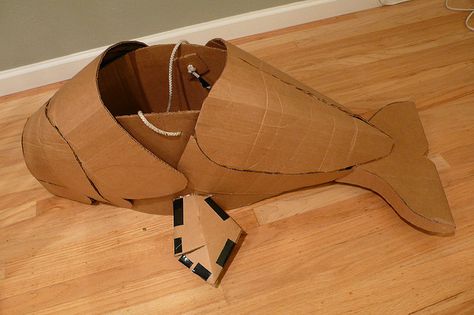 Cardboard Whale Costume Cardboard Fish Costume, Whale Costume Diy, Cardboard Whale, Turtle Pinata, Fish Costume Kids, Cardboard Fish, Rainbow Fish Costume, Whale Costume, Dolphin Costume