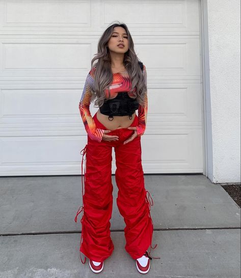 Asian girl wearing red cargo pants from jaded london. Red Cargo Pants Outfit, Red Parachute Pants, Red Cargo Pants, Parachute Pants Outfit, Minimal Streetwear, Lesbian Outfits, Pants And Top, Look Festival, Disneyland Outfits