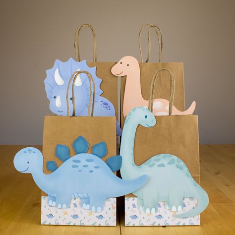 Dinosaur Favor Bags.  PRODUCT DETAILS DIMENSIONS : Size: 5.25 x 3.75 x 8 Inches You can find more Dinosaur theme products: https://www.etsy.com/shop/Ducktoparty?ref=seller-platform-mcnav&section_id=42727042 Make sure to type correctly. Our items are handmade with exclusive designs to make your celebration unique and original.  You may see colors in different shades depending on your computer's resolution.  * This item comes with the items listed. The pictures are just for reference. Dinosaur Party Favors Bags, Dinosaur Gift Bags, Dino Party Favors, Dinosaur Favor Bags, Dino Party Decorations, Baby Dinosaur Party, Birthday Party Dinosaur, 4de Verjaardag, Dinosaur Favors