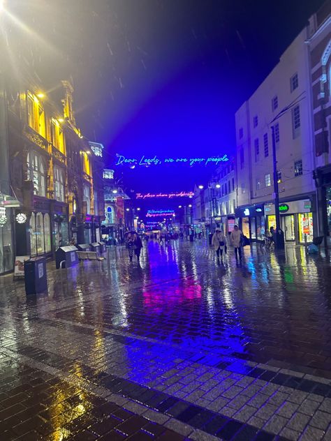 Rainy. City. Leeds. Trinity. Leeds trinity. Blue lights. Yellow lights. Rain. Puddles. Neon lights. City lights. City rain. Night time. Rainy city night. Reflection. Puddles. Cold. Winter. Winter rain. City winter. Rainy City Night, Lantern Parade, Rain Night, Night Reflection, City Rain, Rainy City, Blue Lights, City Night, Neon Lights