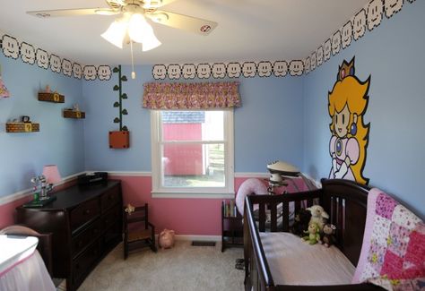 The Princess Peach themed nursery designed by Matt and Melissa Purdy for their daughter. (Aaron Eisenhauer / The Southern) Princess Peach Bedroom Ideas, Gamer Nursery, Princess Peach Nursery, Nintendo Nursery, Princess Peach Room, Princess Peach Bedroom, Princess Peach Room Decor, Mario Nursery Theme, Mario Bedroom Wall