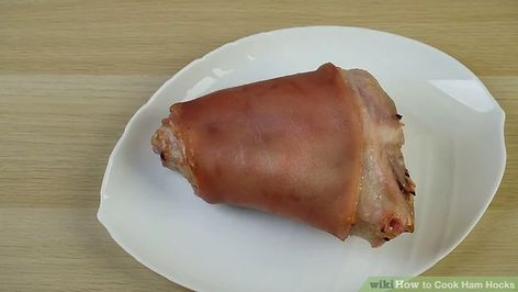 3 Ways to Cook Ham Hocks - wikiHow How To Cook A Ham Hock, Cooking Ham Hocks, How To Cook Ham Hocks, Ham Hock Recipes, Cook Ham, Gluten Free Ham, Boiled Ham, Fresh Ham, Ham Hocks