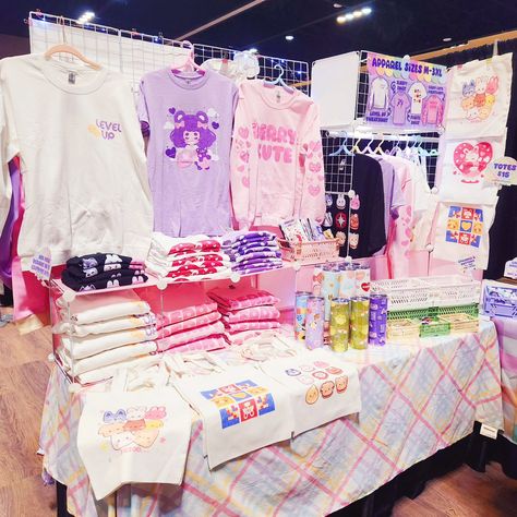 Goodmorning St. Louis! ✨️ #animestl has been absolutely amazing so far and we cannot wait to see everyone today! Make sure to swing by to get your cute goodies as we are quickly selling out of our more popular items such as apparel, tumbler cups, and many different charms! #kpop #artistalley #pastelart #artistoninstagram Booths Ideas, Alley Ideas, Craft Fairs Booth, Market Display, Vendor Booth, Merch Ideas, Market Ideas, Market Displays, Artist Alley