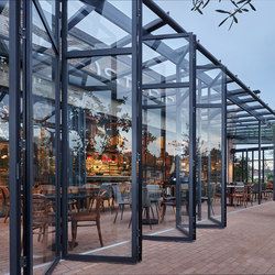 SOLARLUX products, collections and more | Architonic Steel Beam House, Bifold Windows, Beam House, Shoreditch House, Glass Restaurant, Glass Wall Systems, Steel Beam, Outdoor Restaurant Design, Folding Glass Doors