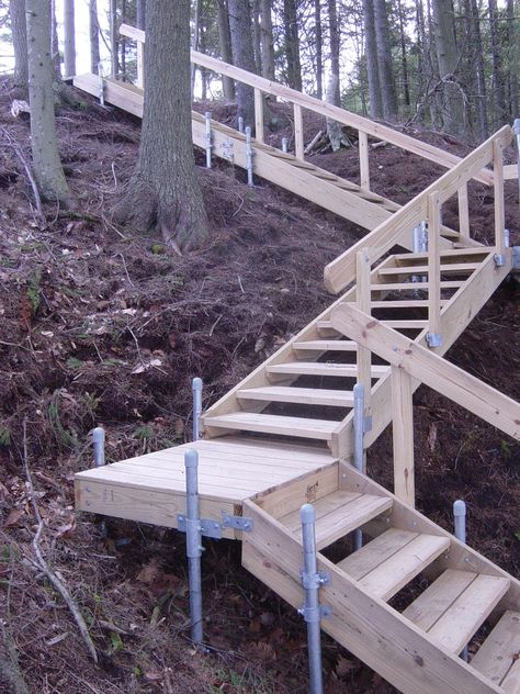 The perfect lakeside deck, this multi-level wood deck breaks up the steep descent to the water YESSS -- for river or lake house in hill country! Description from pinterest.com. I searched for this on bing.com/images Landscape Stairs, Sloped Yard, Sloped Backyard, Garden Stairs, Hillside Landscaping, Outdoor Steps, Deck Stairs, Meteor Garden 2018, Garden Steps