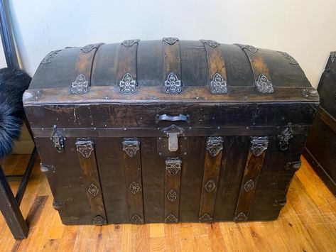 Antique Steamer Trunk with extraordinary hardware! Link in comments #brown #trunk #steamertrunk #antique #antiquetrunk #antiquetrunks #homedecor #interiordesign #interiordesigner #interiordesigners #interiordesignersofinsta #livingroomdecor #bedroom #storage #storagechest #vintagedecor #home #metalart #beauty #beautiful #beautifuldestinations #house #housebeautiful Antique Trunk Restoration, Trunk Restoration, Trunk Makeover, Antique Steamer Trunk, Antique Trunk, Steamer Trunk, Transitional Style, Bedroom Storage, Antique Victorian