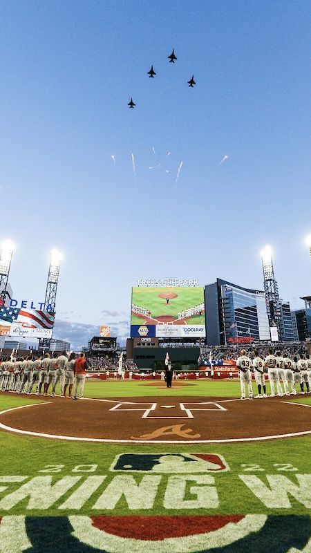 Planes fly over Truist Park during the National Anthem, as players line up on the first and third base lines. Opening Day 2022. Atlanta Braves Aesthetic, Braves Wallpaper, Sports Aesthetics, Atlanta Braves Wallpaper, Brave Wallpaper, Truist Park, Ball Photos, Major League Baseball Stadiums, Baseball Photography