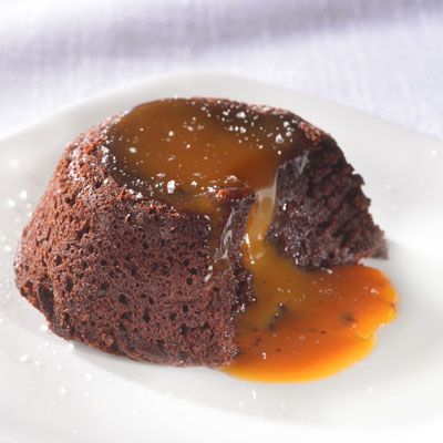 Enjoy these delicious molten cakes with a deep, rich chocolate center. Spoon caramel sauce and coarse sea salt over each cake for a truly elegant dessert. Caramel Lava Cake, Molten Lava Cake, Molten Cake, Molten Lava Cakes, Molten Chocolate, Molten Lava, Lava Cake, Dark Chocolate Cakes, Gateaux Cake