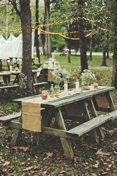 Getting married in a park? A simple runner over a picnic table elevates it to wedding-ready. Picnic Tables Ideas, Picnic Table Wedding, Simple Picnic, Wedding Reception Outdoor, Wedding Reception On A Budget, Campground Wedding, Pavilion Wedding, Picnic Style, Backyard Seating