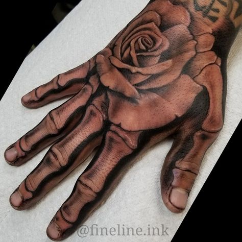 Rose Hand Tattoo With Skeleton Fingers, Men’s Forearm Sleeve Tattoo Ideas, Hand Tattoos For Guys Skeleton, Rose And Skeleton Hand Tattoo, Skeleton Fingers Tattoo, Hand Rose Tattoo Men, Skeleton Tattoo Hand Men, Skeleton Rose Tattoo, Rose Skeleton Hand Tattoo