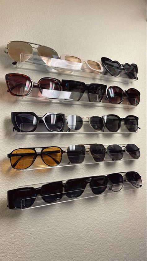 How to organize your sunglasses | Vanity organization ideas | Sunglasses organizer | Sunglasses organizer iseas | By Alexa Edwards Sunglasses Display Ideas, Glasses Organizer Aesthetic, Sunglasses Wall, Ways To Store Sunglasses, Sunglass Storage, Sunglasses Collection, Sunglass Organizer, Sunglasses Rack, Sunglasses Wall Display