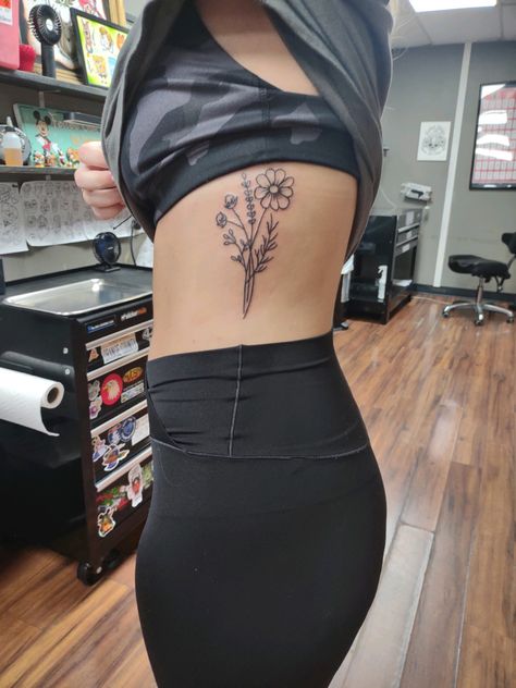 Long Rib Tattoo, Rib Cage Flower Tattoo, Side Rib Tattoos, Floral Rib Tattoo, Flower Tattoo On Ribs, Tattoos On Side Ribs, Rib Tattoos For Women, Basic Tattoos, Bouquet Tattoo