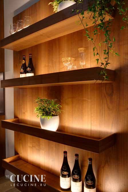 Built In Walnut Shelves, Bar Shelf Lighting, Shelving With Lights, Bourbon Shelves, Column Interior, Salon Shelves, Restaurant Shelving, Columns Interior, Seating In Kitchen