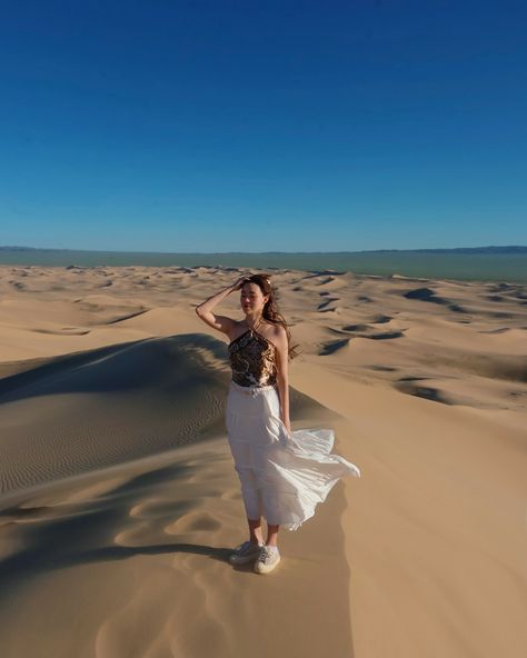 Khongor Sand Dunes in the Gobi Desert, Mongolia. Outfit: scarf tied into a top with white maxi skirt and sneakers. Glamis Sand Dunes Outfit, Mongolia Outfit, Maxi Skirt And Sneakers, Dubai Sand Dunes Photoshoot, Glamis Sand Dunes Photoshoot, Dubai Sand Dunes, Desert Sand Dunes, White Maxi Skirt, Gobi Desert