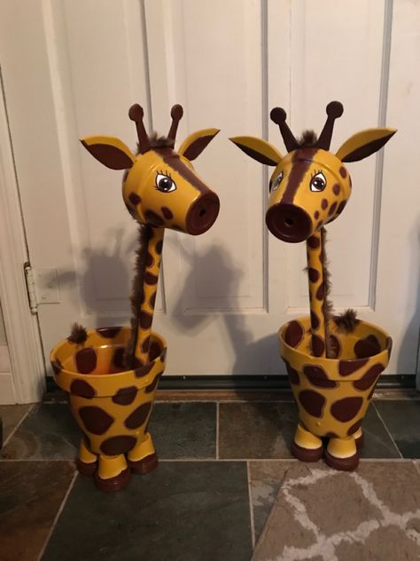 Giraffes made out if terra cotta pots 32” tall 8” base, pvc neck, neoprene ears and horns Giraffe Clay Pot, Giraffe Flower Pot, Terra Cotta Turtles, Terracotta Pot Animals, Clay Pot Animals Diy, Clay Pots Crafts, Clay Pot Animals, Pots Crafts, Flower Wall Hanging Decor