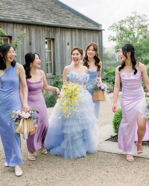 Want to know some of our absolute favourite things for this year's wedding season? 💃 Mix-and-match bridesmaid dresses, especially in those dreamy lilacs and blue hues. It's so chic and SO fun! 💐 Bridesmaid baskets for the WIN - how cute are these joyful bridesmaid bouquets as baskets? 🌂 Bridal accessories like a floral umbrella featuring delicate and colourful blooms. A perfect touch of whimsy. And of course - ALL the colourful palettes we've had the privilege to create so far this year... Lavender Mix Match Bridesmaid Dresses, Purple Blue Bridesmaid Dresses, Blue And Lavender Bridesmaid Dresses, Bridesmaid Dresses Palette, Periwinkle Bridesmaid Dress, Periwinkle Bridesmaid Dresses, Blue Bridal Dress, Bridesmaid Baskets, Periwinkle Wedding