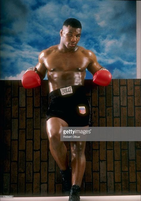 Heavyweight boxer Mike Tyson poses for a portrait. Young Mike Tyson, Fancy Date Night Outfit, Men Street Outfit, Iron Mike Tyson, Sugar Ray Robinson, The Heartbreak Kid, Boxing Legends, King Picture, Boxing Images