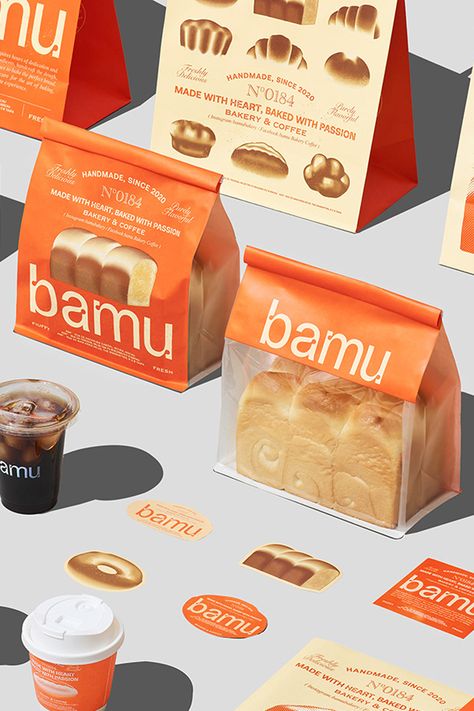 Behold Bamu Bakery's vibrant brand identity and packaging by Indego Macao. This design fuses traditional bakery charm with modern aesthetics, where every detail from color to typography evokes warmth and appeal. Note: Fivestar Branding Agency is a design and branding firm. This showcased work, credited to the original artist, is curated for inspiration. 🍞🧡 #BrandIdentity #PackagingDesign #BakeryBranding #DesignInspiration #FoodPackaging #Branding #BakeryPackaging #GraphicDesign #LogoDesign Graphic Design Food Packaging, Cookie Branding Design, Logo Korea, Bread Branding, Food Branding Design, Bakery Brand Identity, Traditional Bakery, Christmas Packaging Design, Box Packaging Ideas