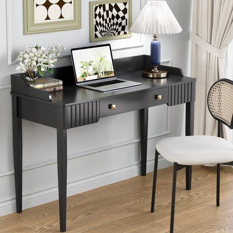 PRICES MAY VARY. 【Save space】This desk size: 43.3 W x 17.7D x 33.4 H inch the compact design ensures that it can be placed in a small space in the corner of dormitory or apartment.Ideal for use as a Vanity desk or writing desk. Vintage shaped hoardings can prevent items from falling. A large capacity drawer that meets all your sorting and placement needs. The drawer is equipped with smooth rails and two gold handles. 【Appearance material 】High Quality，Environmentally friendly coating, thick MDF White Makeup Table, Black Makeup Table, Black Vanity Desk, White Vanity Desk, Desk With Drawer, Wood Computer Desk, Modern Computer Desk, Desks For Small Spaces, Desk Size