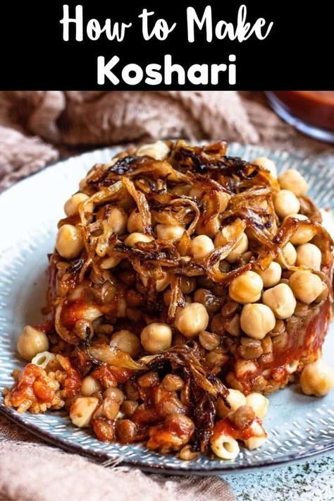 Koshari is the national dish of Egypt, made by layering lentils, pasta, rice, chickpeas, tomato sauce, and fried onions together! Lentils Pasta, Koshari Recipe, Middle Eastern Recipes Arabic Food, Rice Lentils, Crispy Fried Onions, Middle East Recipes, Spiced Rice, Pasta Rice, Egyptian Food