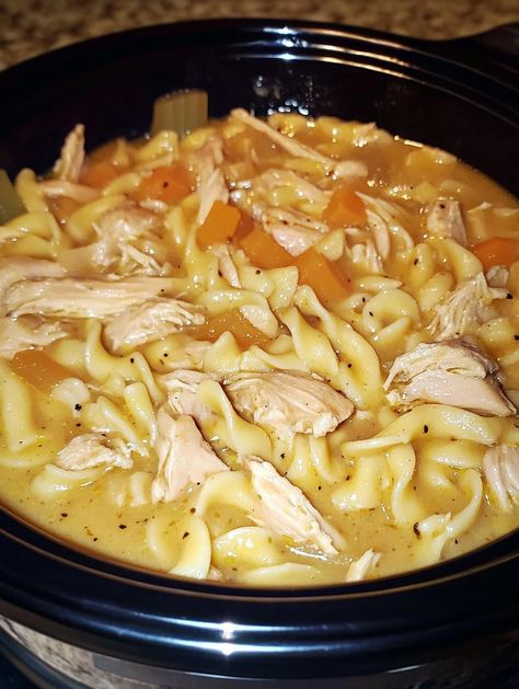 Crock pot chicken and noodles is a warm, comforting one-pot meal that's easy to make and perfect for busy weeknights. This classic dish combines tender, fall-off-the-bone chicken thighs or breasts with noodles or dumplings cooked Crockpot Chicken And Frozen Noodles, Chicken Noodles Slow Cooker, Chicken And Noodle Crockpot, Chicken And Noodles Dairy Free, Thanksgiving Noodles Crock Pot, Chicken And Noodles In Crockpot, Turkey And Noodles Crockpot, Canned Chicken Crockpot Recipes, Crockpot Chicken And Noodles Recipes