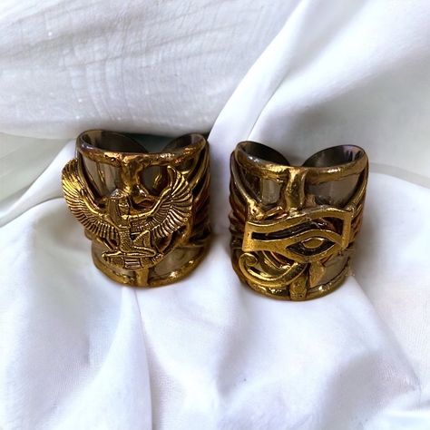 Subscribe to our newsletter NOW: http://eepurl.com/dEBXqb. BUY today and save 10% off all purchases of $50 or more (FREESHIPDOM2), plus free shipping within the USA!  Check out this pair of Egyptian-style rings.  It is said that the Eye of Ra functions as a feminine counterpart to the sun god Ra and protects him from his enemies. Moreover, she is his partner in the creative cycle in which he begets the renewed form of himself born at dawn.  The Eye of Ra's life-giving power was celebrated in temple rituals and protected the pharaoh, sacred places, and ordinary people and their homes. Maat is the Egyptian Goddess of truth and justice. Maat was personified as a goddess regulating the stars, seasons, and the actions of mortals and the deities, who set the order of the universe from chaos at t Goddess Of Truth, The Eye Of Ra, Egyptian Earrings, Eye Of Ra, Egyptian Style, Truth And Justice, Sun God, Egyptian Jewelry, Egyptian Goddess