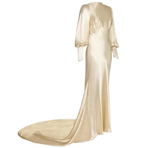 View this item and discover similar for sale at 1stdibs - Extraordinary vintage 1930s wedding dress in soft ivory silk satin with high neck, open back and cuffed balloon sleeves. This is an extremely elegant gown 1930s Wedding Dress, 1930s Wedding, Floral Print Gowns, Satin Wedding Gown, Evening Mini Dresses, Velvet Cocktail Dress, Silk Wedding Dress, Printed Gowns, Wedding Gowns Vintage