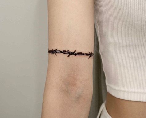 Barbed Wire Tattoos Around Arm, Meaningful Wrap Around Tattoo, Mens Cuff Tattoo, Barbed Wire Wrapped Around Arm Tattoo, Chain Tattoo Around Arm, Barbed Wire Arm Band Tattoo, Wrist Chain Tattoo, Wire Tattoo Arm, Arm Cuff Tattoo For Women