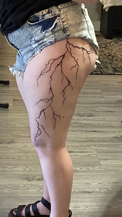 Lightning strike thight tattoo Lightning Tattoo Women Leg, Lightning Strikes Tattoo, Lighting Tattoo Thigh, Lightning Tattoo On Thigh, Lighting Tattoo On Thigh, Lightning Bolt Tattoo Thigh, Lightning Bolt Leg Tattoo, Thigh Lightning Tattoo, Lighting Leg Tattoo