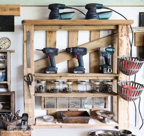 Learn how to organize your tools on an enhanced pallet shelf made for free! Includes cubbies to store screws, nails, sandpaper, etc! #tools #toolstorage #organize #funkyjunkinteriors Garage Layout, Pallet Storage, Overhead Garage, Garage Tool Storage, Garage Organize, Funky Junk Interiors, Diy Garage Storage, Pallet Decor, Garage Makeover