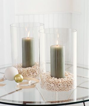 I'm obsessed with candles...adding small marbles or stones at the bottom of a glass cylinder to make a boring candle look fancy. Found this on realsimple.com Grocery Store Items, Glass Vase Decor, Candle In The Wind, Case Ideas, Cylinder Vase, Candle Vase, Vase Fillers, Vase Candle Holder, Glass Decor