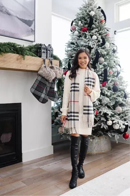 The perfect holiday outfit with a cream sweater dress that’s cable knit and a luxe Burberry scarf. I’ve wanted one of these famous cashmere scarves for so long and it doesn’t disappoint! Get up to a $700 gift card from SAKS with your purchase. Wearing size XS in the dress and the boots fit true to size. #LTKHoliday #LTKsalealert #LTKstyletip Burberry Scarf Outfit, Beige Sweater Outfit, Europe Christmas, Scarf Outfits, Giant Check, Cream Sweater Dress, Cable Sweater Dress, Cashmere Scarves, Boots Fit