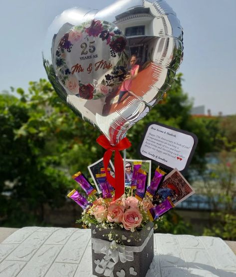 25th Anniversary Hamper for a special couple made of fresh flowers, chocolates and foil balloon Balloon Hamper, Anniversary Hamper, Happy 25th Anniversary, Parents Anniversary, Couples Anniversary, Mehndi Designs For Fingers, Gift Hampers, 25th Anniversary, Foil Balloons