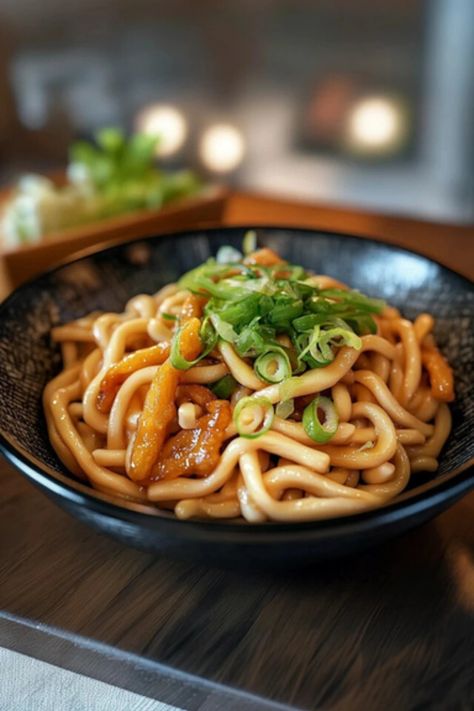 Discover the vibrant flavors of Japan with this easy Yaki Udon recipe! Featuring thick udon noodles stir-fried with tender veggies, savory soy sauce, and your choice of protein, this dish brings authentic Japanese taste right to your kitchen. Perfect for a quick meal or a satisfying dinner, it's a recipe you'll want to make again and again.

Whip up something special – get the recipe now

#YakiUdon #JapaneseFood #UdonNoodles #StirFriedNoodles #EasyDinner #JapaneseRecipe #WeeknightMeal #... Yaki Udon Recipe, Japanese Noodle Dish, Fried Udon, Teriyaki Noodles, Udon Recipe, Yaki Udon, Recipe Japanese, Drunken Noodles, Easy Japanese Recipes