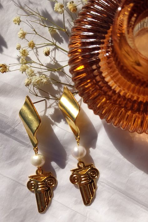 ☙ Elegant earrings with freshwater pearls and column motifs in Grecian aesthetic. These earrings are inspired by Greek architecture and mythology and they are lightweight and comfortable to wear. You can offer them, as a souvenir, to a friend that visited Greece and loved it, as a bridesmaid gift, a birthday gift etc. ❧ Details : ❥ Column size : 2.5x1.7 cm ❥ Earrings length : 6.8 cm ≈ 2.6 inches ❥ Earrings weight : 0.010 kg www.etsy.com/shop/LeChatAccessories Greek Jewelry Aesthetic, Ancient Greek Jewelry Aesthetic, Ancient Greek Accessories, Greek Mythology Earrings, Greek Style Earrings, Greek Mythology Jewelry, Ionic Column, Visiting Greece, Elegant Earrings