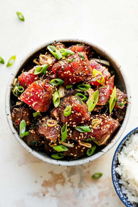 Learn how to make homemade poke bowls with my Hawaiian Mom's Ahi Tuna Poke Bowls recipe, which is inspired by the poke of her childhood in Honolulu & is the absolute BEST! Prepare a classic shoyu poke by marinating cubed ahi tuna, sweet onion, & seaweed in a simple poke sauce of shoyu & sesame oil, then serve it with rice & whatever poke bowl toppings you love most. A true taste of the Hawaii at home! #poke #tunapoke #ahipoke #shoyupoke #hawaiianfood #pokebowl #pokebowlrecipe #pokebowlideas Poke Sauce, Tuna Poke Recipe, Homemade Poke, Tuna Poke Bowl Recipe, Hawaiian Poke Bowl, Ahi Tuna Poke, Poke Recipe, Poke Bowl Recipe, Tuna Poke Bowl