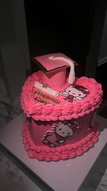 Pamela Anaele on Instagram: "Congrats Carina! Hello Kitty Graduation heart cake🤩. I love everything about this cake. From the heart shape to the color pink, the gold sugar pearls, the hello kitty’s around and on top the cake and of course the glitter. #baltimorebaker #baltimorecakes #pinkcake #glittercake #heartcake #vintagecake #cakereels #caketrends #trendingreels #dmvbaker #dmvcakes #instacake #customcakes #cakesofinstagram #birthdaycake #cutecake #blowthisup #graduationcake #graduationcap #hellokitty #hellokittycake" Cake Designs Graduation, Glitter Heart Cake, Pink Glitter Cake, Hello Kitty Graduation, Heart Cake Decoration, Graduation Board, Hello Kitty Birthday Cake, Nursing Graduation Pictures, Nursing Cake