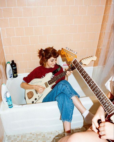 70s Musician Aesthetic, Band Concept Photoshoot, Guitar In Bathtub, Guitar Film Photography, Playing Guitar In Bathtub, Female Band Photoshoot, 70s Photoshoot Ideas At Home, Jam Band Aesthetic, Indie Music Photoshoot